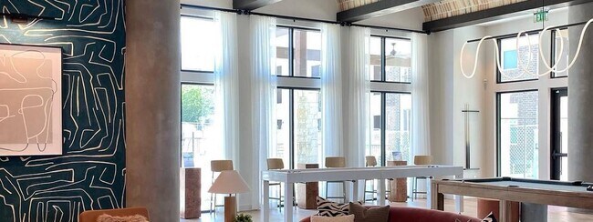 Building Photo - Elite Echoes: Where Luxury Resonates