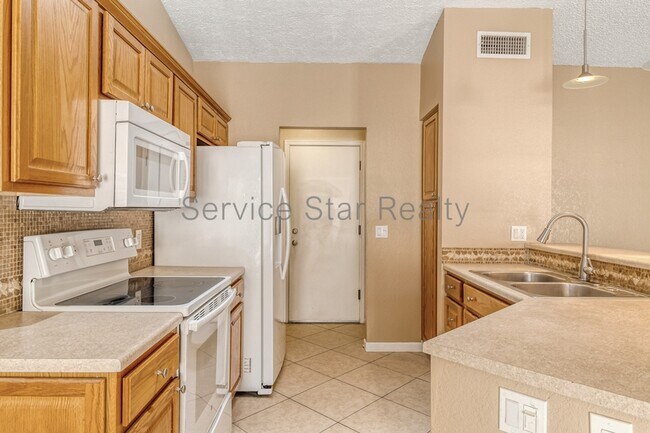 Foto del edificio - 10415 N 63rd Dr
