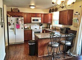 Building Photo - "Spacious 4-Bedroom Aurora Gem with Cozy Fireplace and 3 Full Baths!"