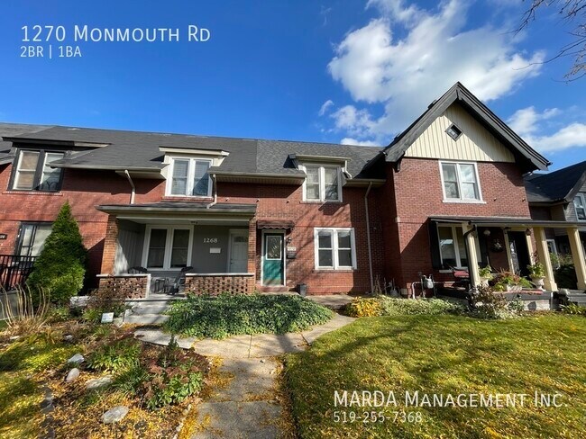 Photo du bâtiment - COZY & SPACIOUS 2 BED / 1 BATH UNIT IN WAL...