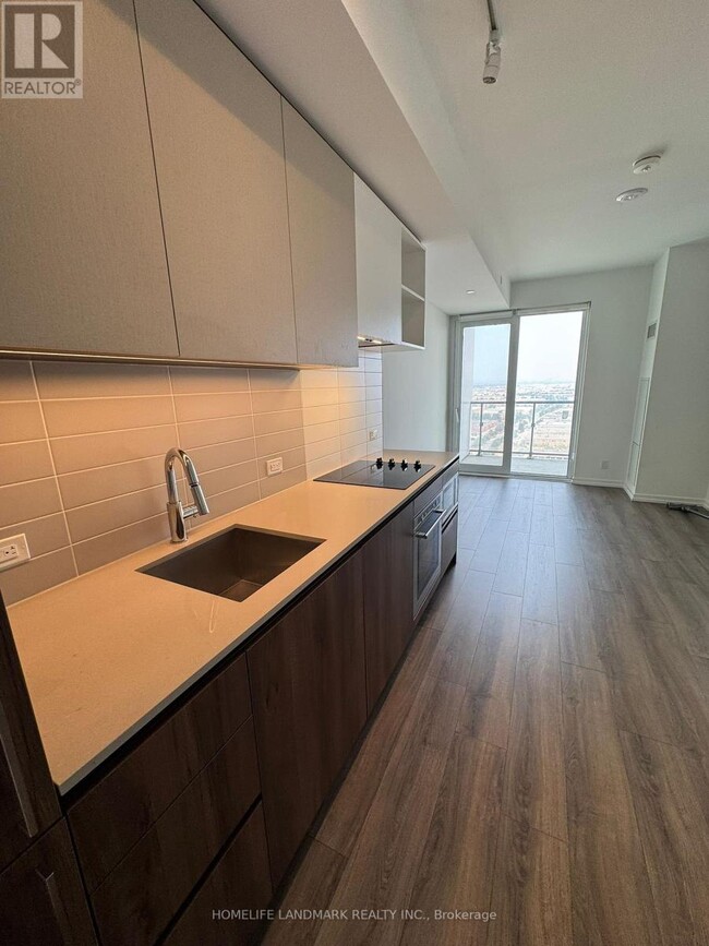 Photo du bâtiment - 1000-1000 Portage Pkwy