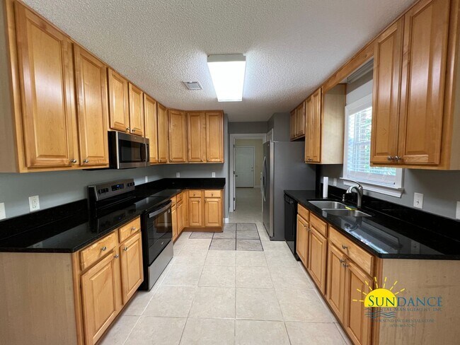 Building Photo - Spacious 3-Bedroom Retreat with New Kitchen Appliances!