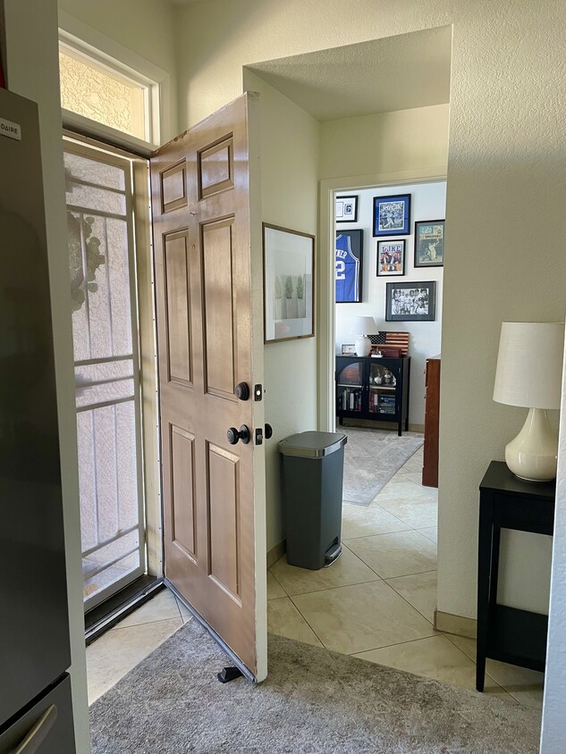 Main level entry near covered assigned parking - 7101 W Beardsley Rd