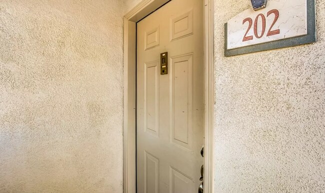 Building Photo - COMING SOON! Upgraded Summerlin Condo with Garage in Highly Desirable Gated Community