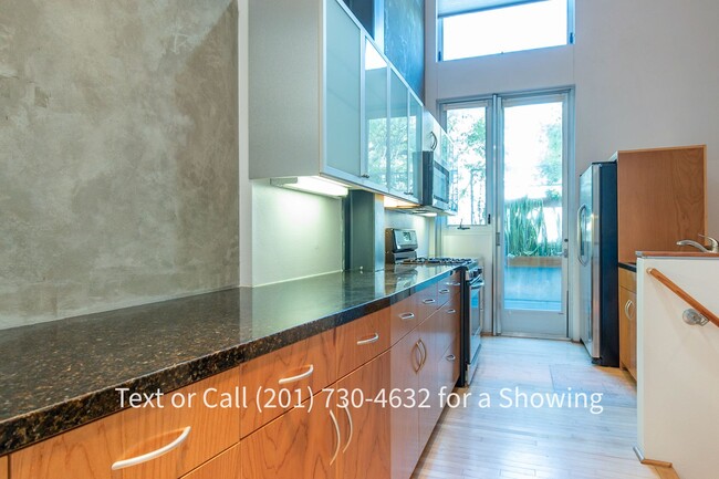 Building Photo - Modern Large 2 Bedroom, 2.5 Bath Rowhouse ...