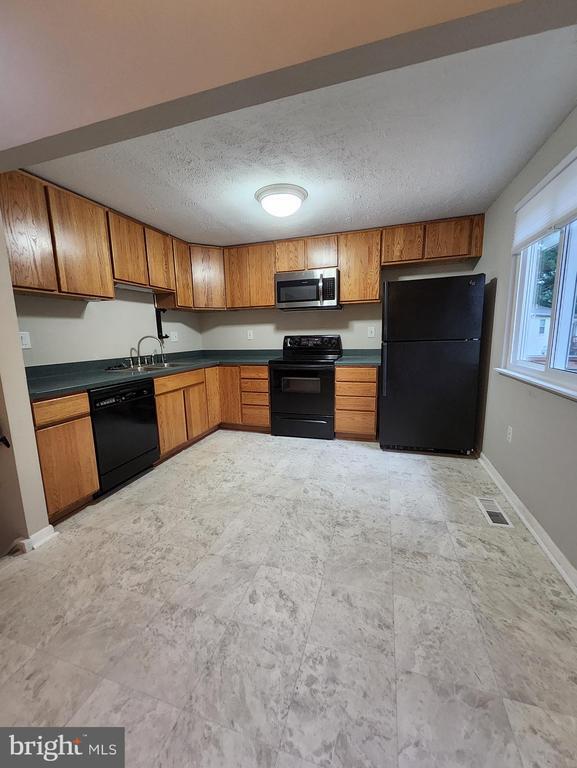 Foto del edificio - 6461 Lancaster Dr