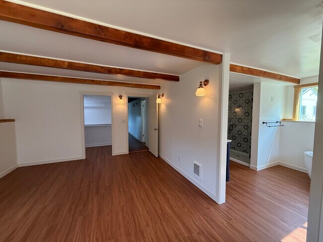 Master suite bedroom facing door and walk in closet - 13016 16th St NE