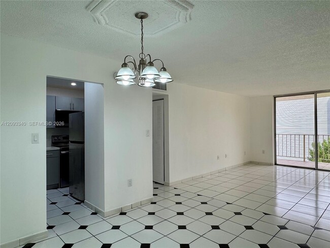 Building Photo - 4675 W 18th Ct