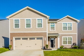 Building Photo - 7052 Mardenis Dr N