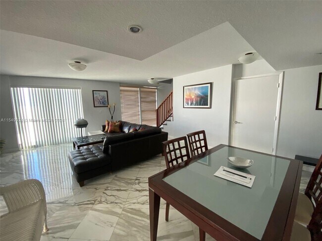 Building Photo - 7600 Collins Ave