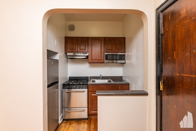 Building Photo - 948 W Cuyler Ave
