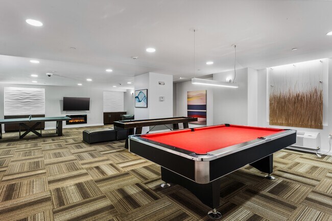 Our resident lounge is the perfect spot to meet with friends for a game - Newport Rentals