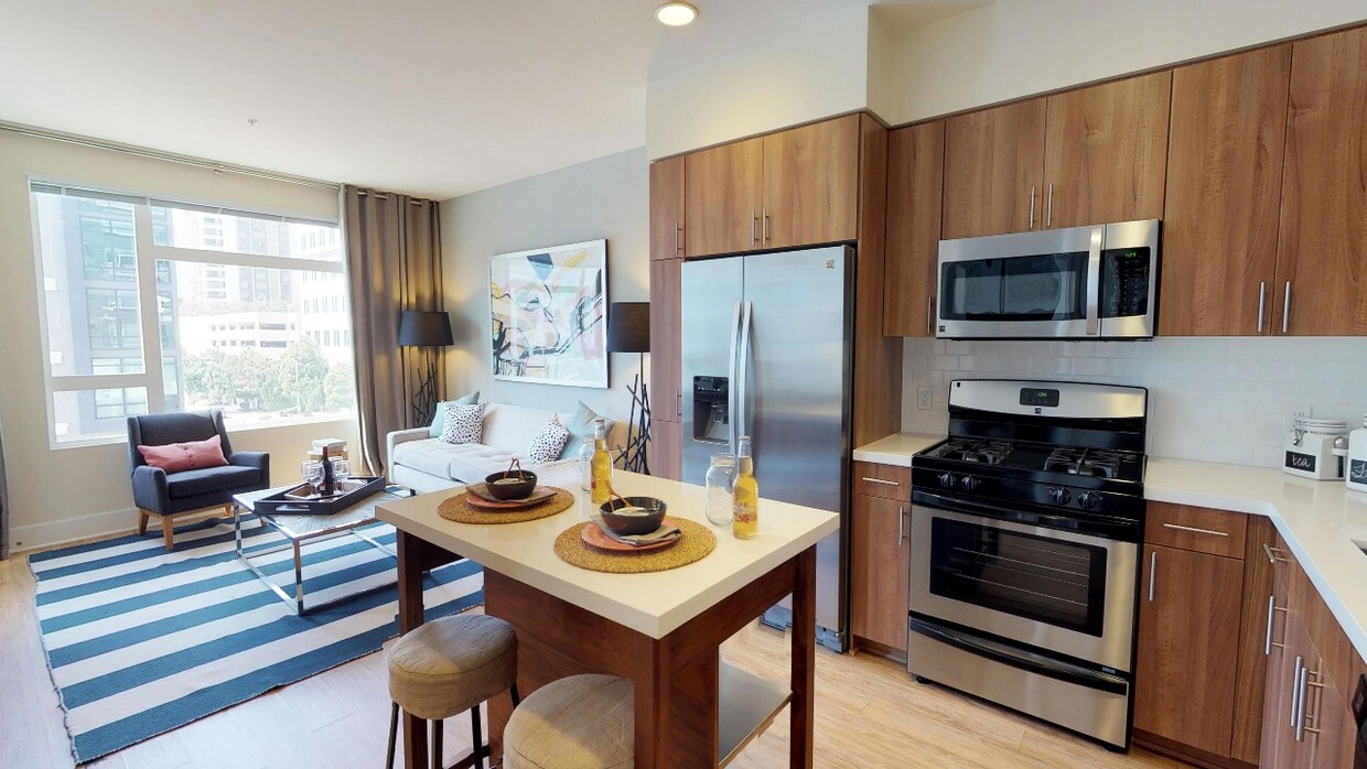 Cocina de primer nivel que cuenta con cocina a gas y refrigerador puerta francesa - Modera Glendale