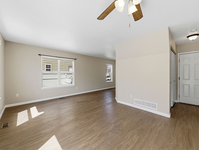 Building Photo - Recently Refreshed 3 Bed, 2.5 Bath Duplex with Fenced Yard — Available Now in Evans, CO!