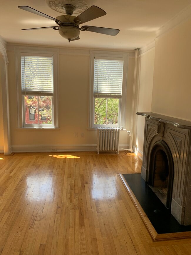 Decorative fireplace, hardwood floors - 284 Pavonia Ave