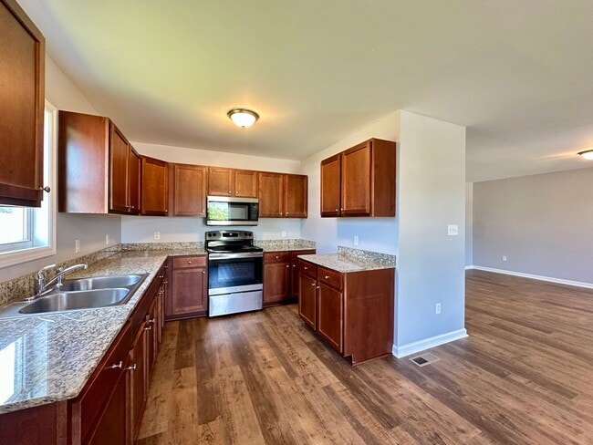Building Photo - Location, Community, Quality Living. It St...