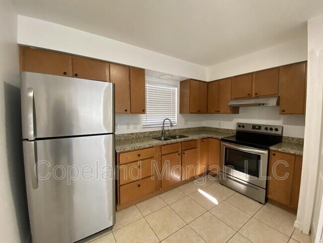 Building Photo - 5613 E 127th Ave