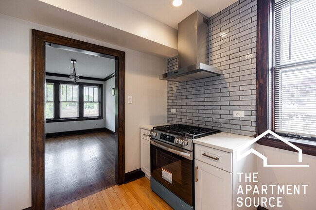 Foto del edificio - 6409 N Talman Ave