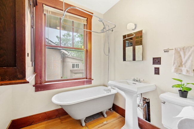 Bathroom with clawfoot tub + shower - 306 S 8th Ave