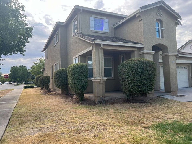 Photo - "Spacious 4-Bedroom Haven in Merced with 3 Full Baths & Elegant Granite Countertops!" Apartment
