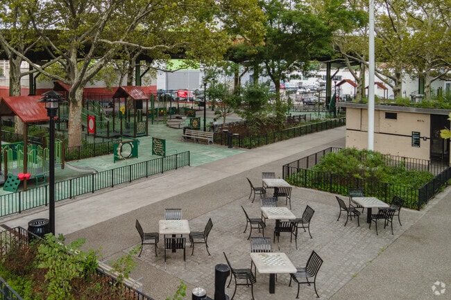 Picnic tables double as chessboards at John Allen Payne Playground.