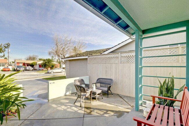 Front outdoor patio area facing street (furniture not included) - 5536 W 134th Pl