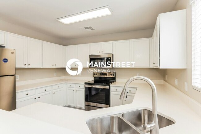 Foto del edificio - 4 Bedroom Pet-Friendly Home in El Mirage, AZ with Main Street Renewal