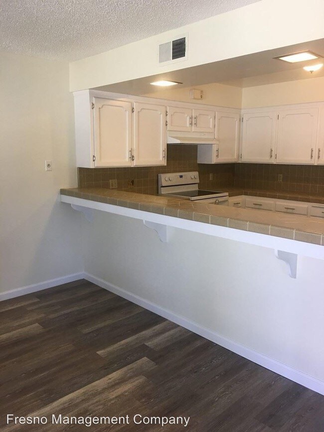 Foto del edificio - 4915 N Harrison Ave