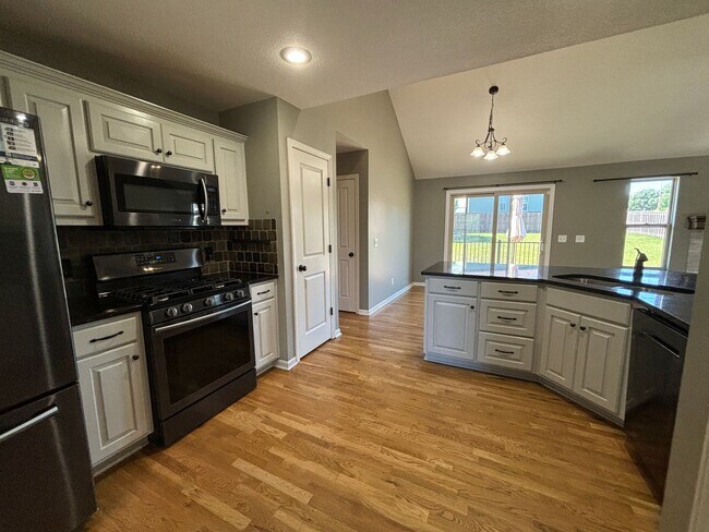 Building Photo - 4-Bedroom, 3 Bath Single Family for Rent in Kansas City, MO | 2 Car Attached Garage &  Fenced bac...