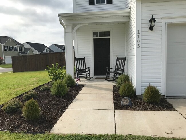 Building Photo - Corner Lot with Fenced in Yard!
