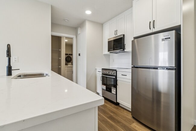 Building Photo - 21003-21025 25 Ave NW