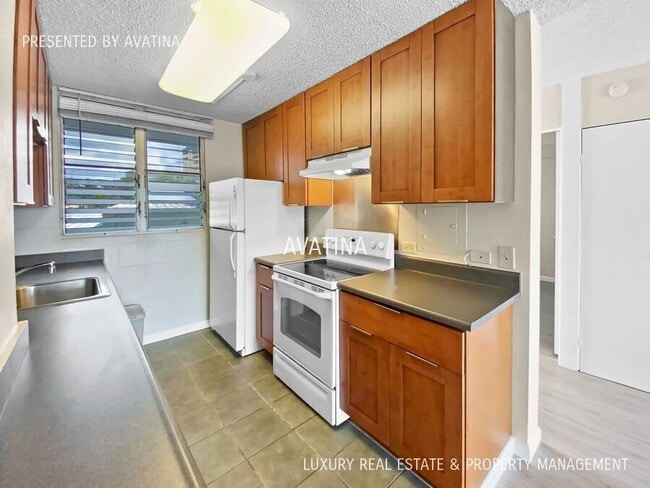 Building Photo - 99-060 Kauhale Street 201-