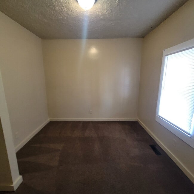 Building Photo - 3/2 with fenced-in backyard & storage shed