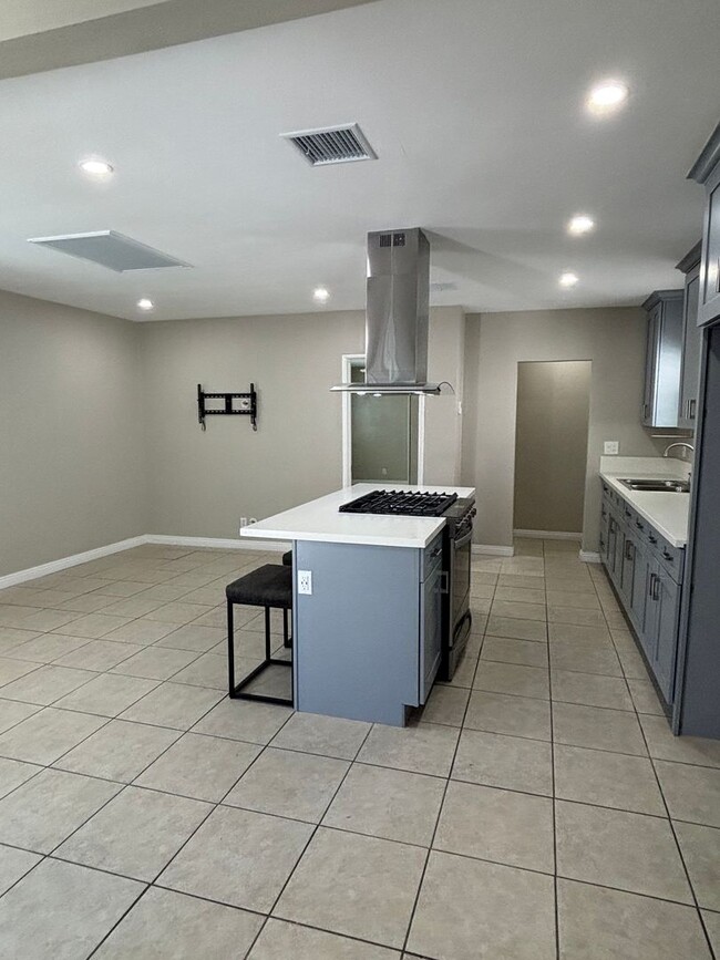 Building Photo - Cozy, Updated, and Pet-Friendly — Your New...