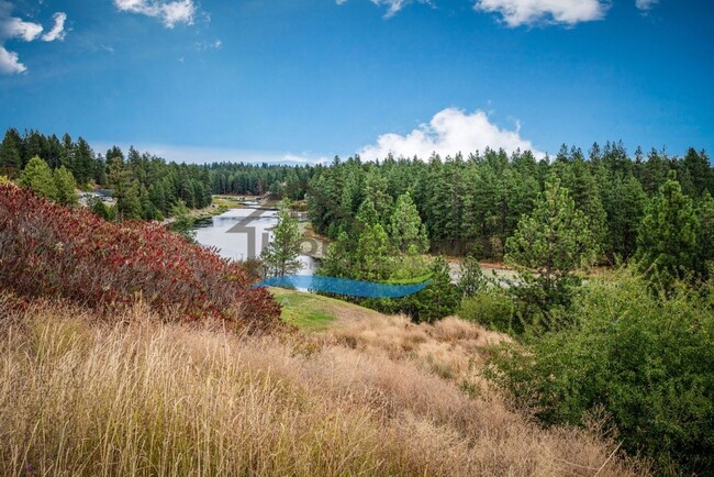 Building Photo - Post Falls Riverfront Home!