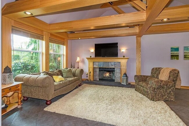 Photo - Spacious 5-Bedroom Home with Fenced Yard a...