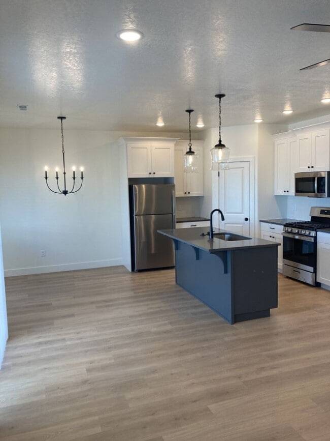 Building Photo - 3 Bed - 2.5 Bath, Newer Construction Large Condo - 2 Car Garage