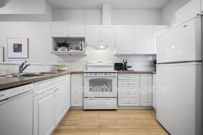 Building Photo - 622-656 56 Ave SW