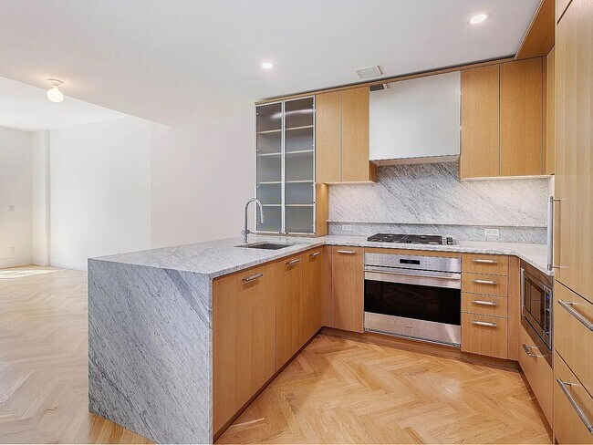 Foto del edificio - 300 W 122nd St