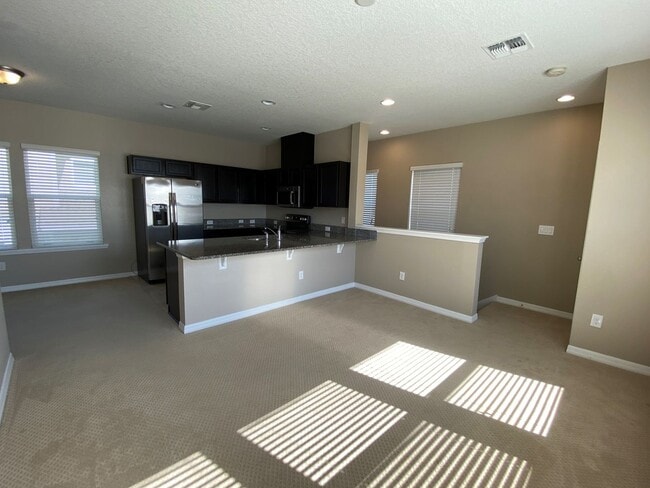 Foto del edificio - Brand New 1 Bedroom Unit in Laureate Park