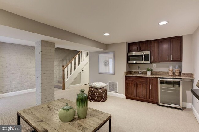 Open plan living area/kitchen taken from front entrance - 3914 New Hampshire Ave NW