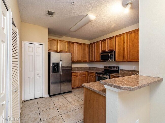 Building Photo - 6935 Ortega Woods Dr
