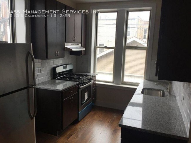 Building Photo - Awesome Humboldt Park 2bd.1bth Coach House