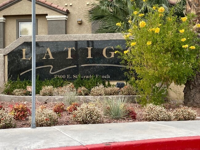 Building Photo - Gated community just minutes south of the strip, 2br/2bath, 2nd floor condo.