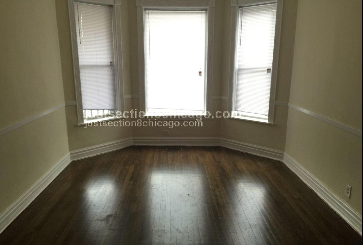 Building Photo - 7210 S Vernon Ave