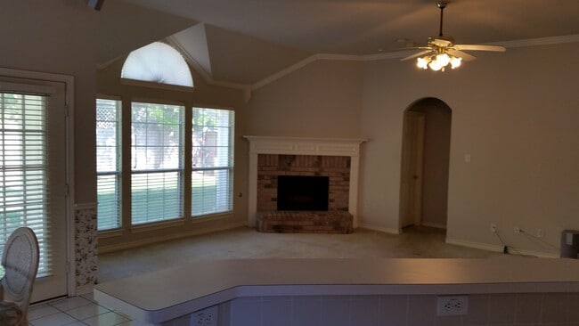 Spacious living room with a great view into the back yard - 7805 Brook Meadow ln