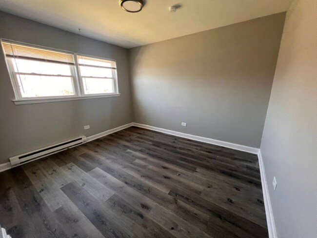 Foto del edificio - 2109-2123 W 119th St