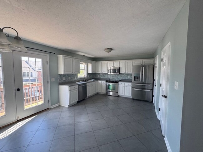 Building Photo - Townhome at Wellington in Wyndhurst Neighb...