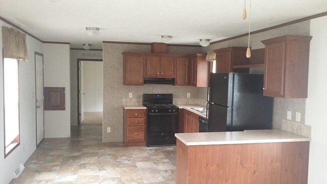 Old photo before a remodel - appliances are white - 53 Gore Road Park