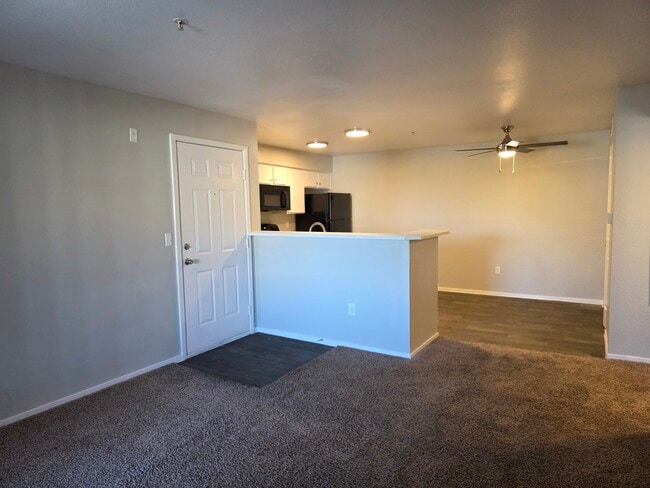 Lily Upstairs - Living room facing the dining room/kitchen - Bella Fiore